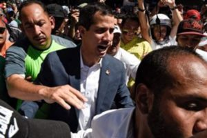 Venezuela’s opposition leader Juan vows to bring in aid