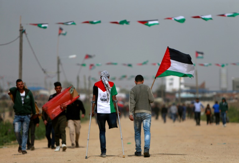 Four killed as thousands protest at border, but Gaza-Israel truce holds