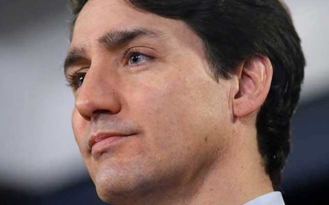 Under pressure, Canada’s Trudeau denies impropriety, offers no apology