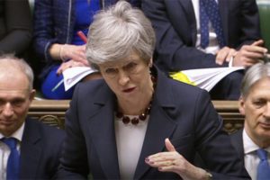 PM May says she’ll resign if parliament passes her Brexit deal