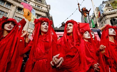 Climate activists occupy major London landmarks