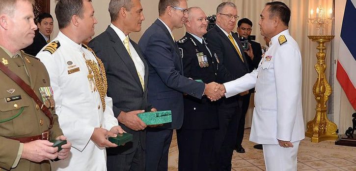 Australian divers given Thai royal honours for cave rescue