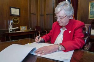 Alabama governor signs strictest US abortion ban into law