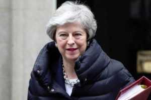 Britain’s May should set resignation date next week
