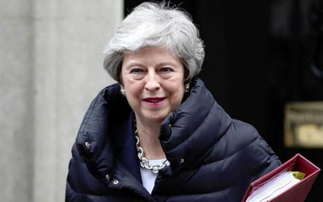 Britain’s May should set resignation date next week