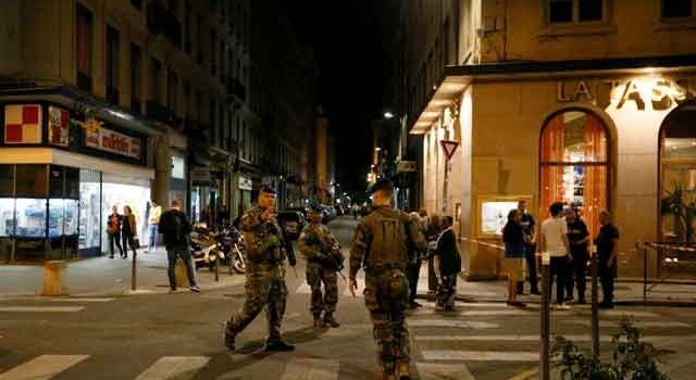 French police hunt suitcase bomber after blast in Lyon