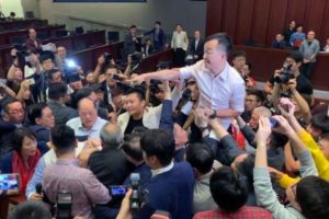 Hong Kong legislators brawl over contentious extradition law
