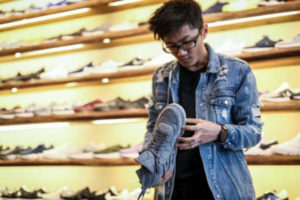 Shoe giants urge Trump to end trade war