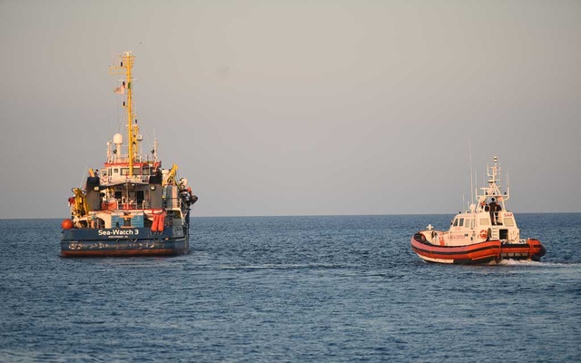 Italian police arrest migrant-rescue ship captain after docking