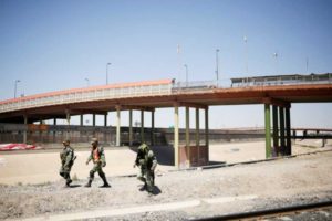 Mexico national guard shows lighter touch with migrants