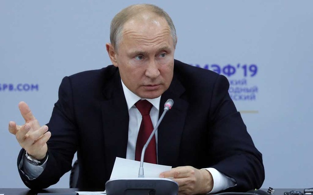 Putin stands by China, criticises US, in trade, Huawei disputes