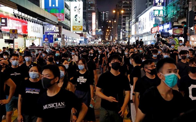 Hong Kong protesters appear in court to face “riot” charge