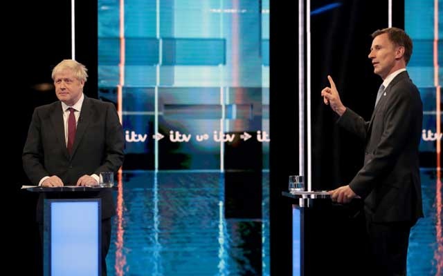 Britain’s PM hopefuls battle over Brexit in bad-tempered debate