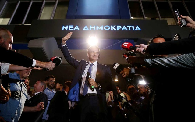 Greek Conservatives take charge in landslide win