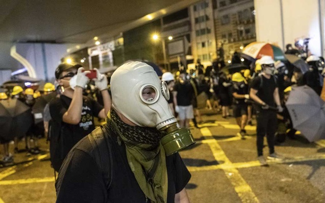 Mob attack at HK train station heightens tensions