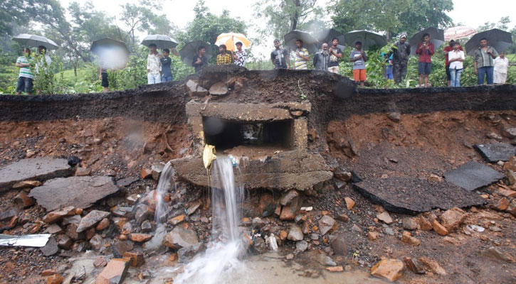 Multiple walls collapse in India monsoon rains, 27 killed