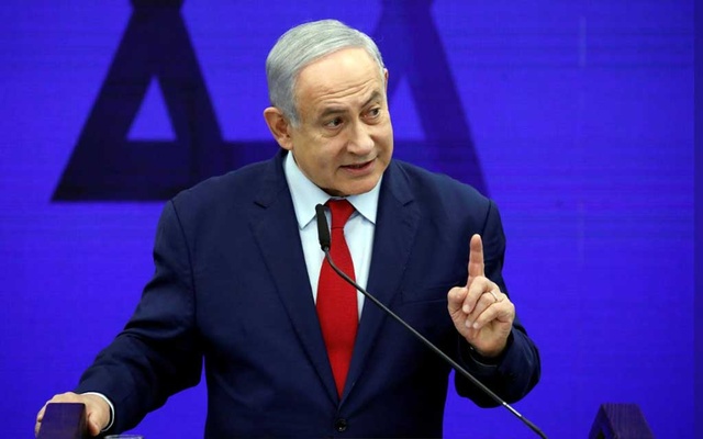 Israel strikes Gaza after rocket sirens force Netanyahu off stage