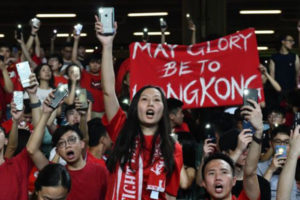 Hong Kong protesters sing and boo China anthem