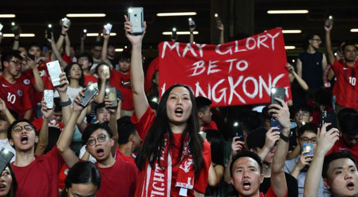 Hong Kong protesters sing and boo China anthem