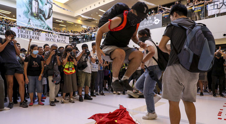 Flag desecrated in fresh Hong Kong unrest