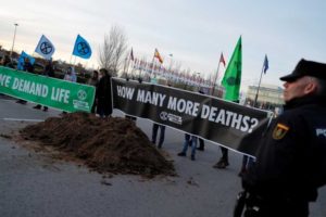 Activists dump manure outside Madrid summit