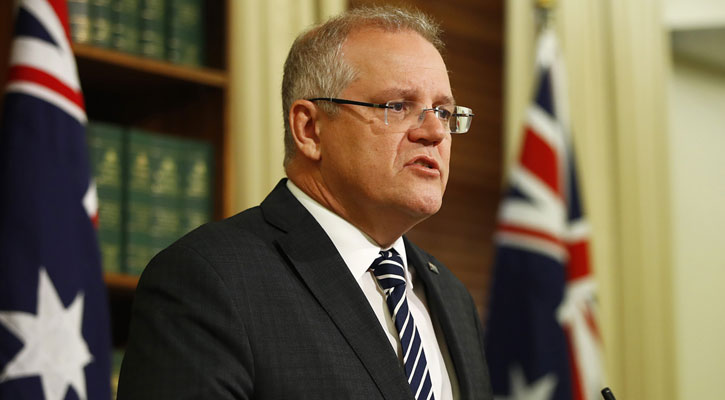 Australia PM Morrison apologises for US holiday amid crisis