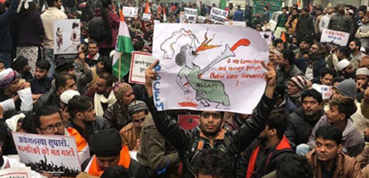 Police seen firing in air during protests in India