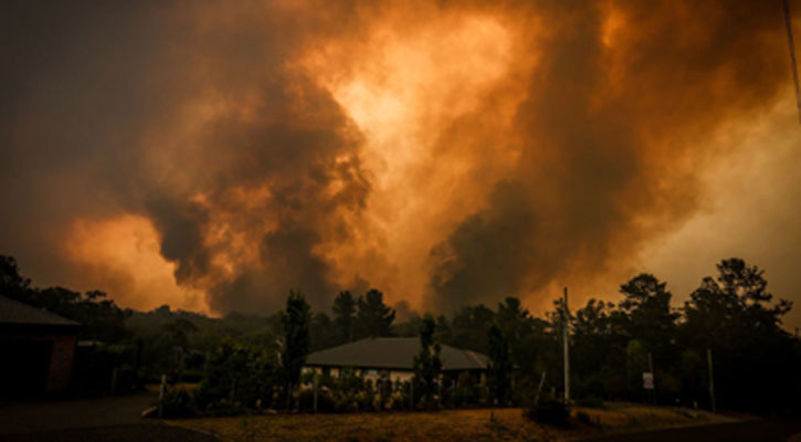 Australia PM rejects cuts to coal as fires rage