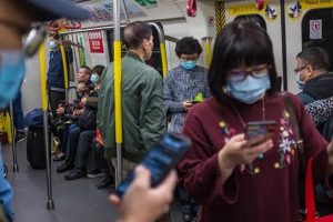 Hong Kong to slash border travel as coronavirus spreads
