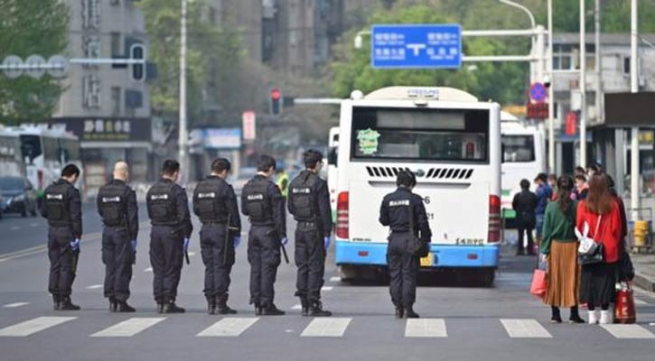 China mourns Covid-19 victims with 3-minute silence