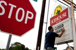 Florida, Texas reverse reopening as US corona cases pass 2.5m