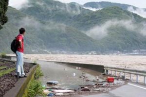 Japan floods leave some 20 dead, more rains expected