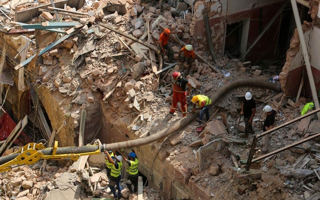 Rescuers sift Beirut rubble amid signs of life a month after blast