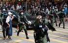 Hong Kong police fire pepper balls at protesters