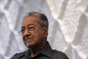 Mahathir denies promoting violence