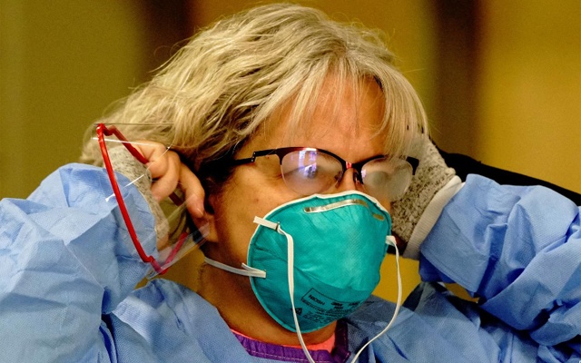 As US pandemic intensifies, North Dakota becomes 35th state to require masks