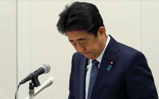 Ex-Japan PM Abe says sorry over political funding case