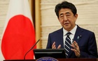 Prosecutors question former Japan PM Abe