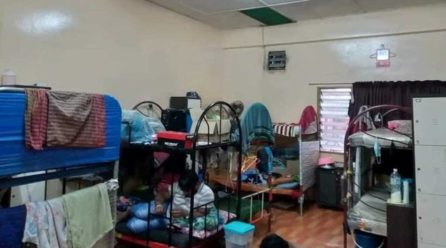 Malaysia to charge second glove maker over poor worker accommodation