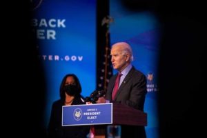 As Trump is impeached, Biden tries to stay above the fray