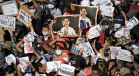 Police clamp down as Myanmar protesters defy ban