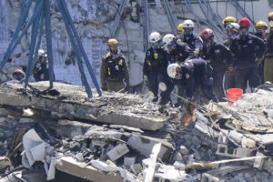 Families of the missing visit site of Florida condo collapse