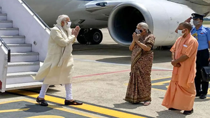 Indian PM Modi lands in Varanasi, received by UP Guv, CM