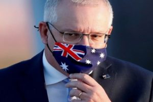 Australia PM meets with state leaders as virus cases surge