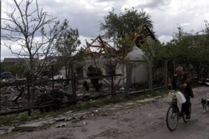 Ukraine neighbours face shelling with defiance or despair