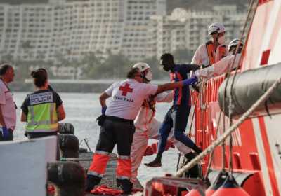 Rescuers save 86 migrants from boat near Canary Islands