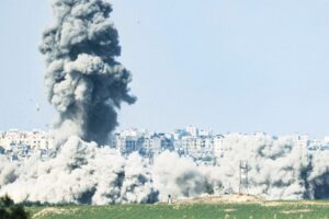 Gazans await aid, Israel readies invasion