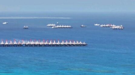 Philippines says over 135 Chinese boats ‘swarming’ reef off its coast